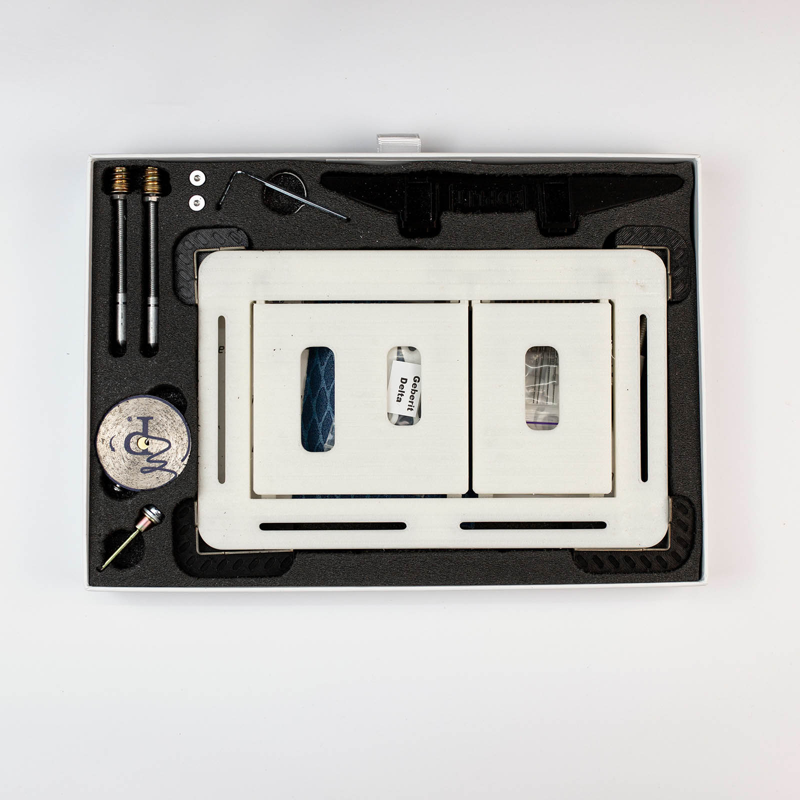 Adhesive cutting template for Invisi Tile Touch hidden flush button – used for precise tile cut-out.