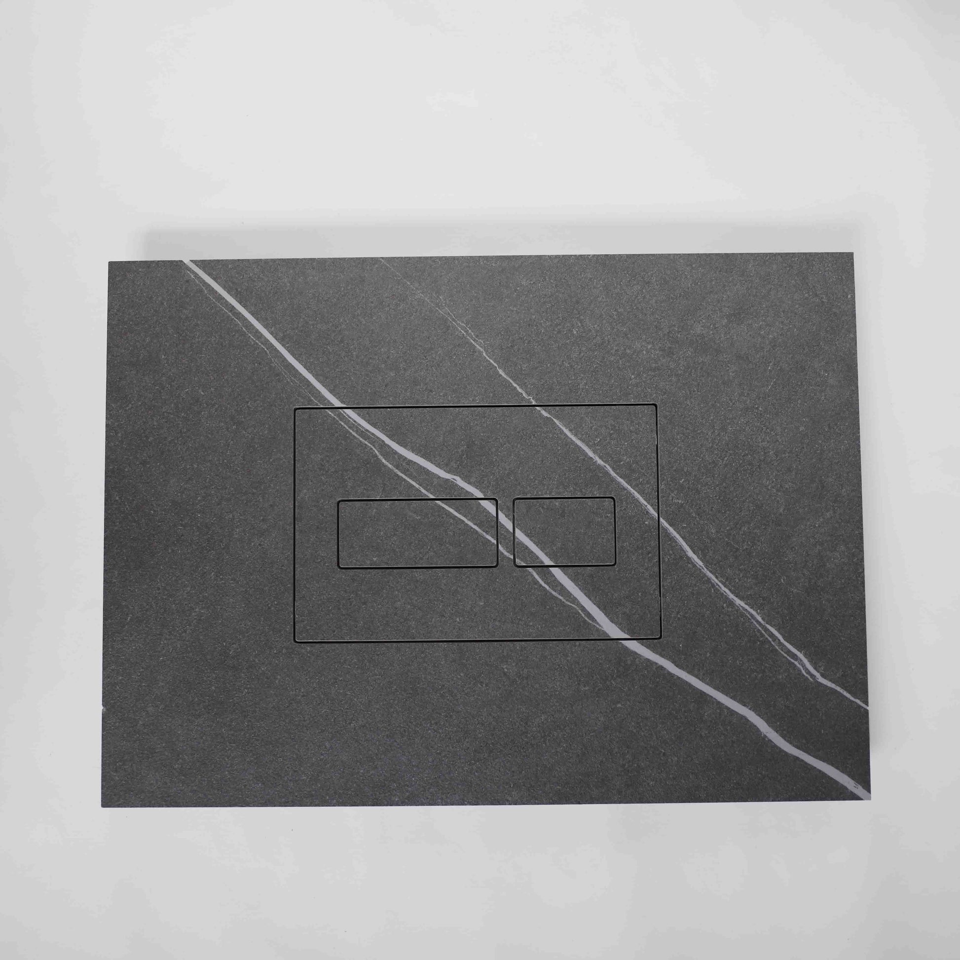Hidden toilet flush button Edplit M2 blends into tiled bathroom wall