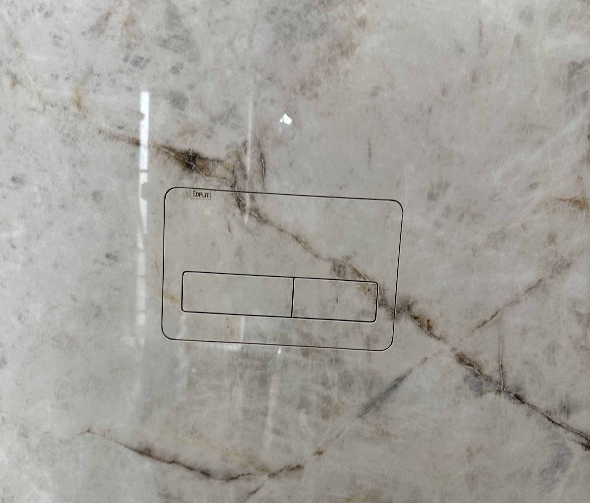 Modern bathroom featuring hidden flush button M2 for sleek minimalist look