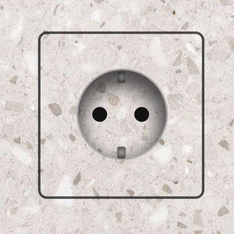 Flush-mounted electrical outlets and push switches by EDPLIT for minimalist interiors.