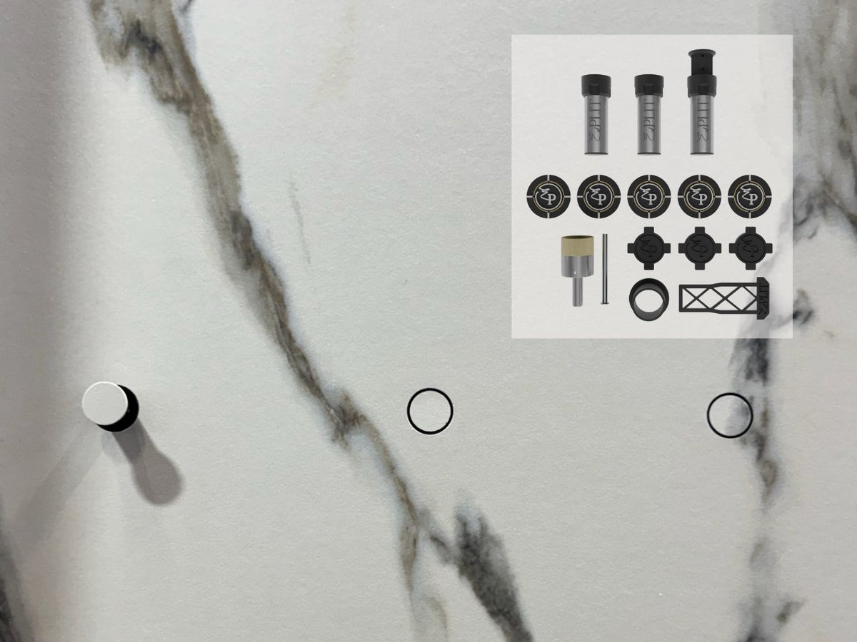 EDPLIT hidden towel holders installed in large-format marble wall